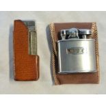 A mid 20th Century Dunhill Rollagas lighter in original leather cover, initialled C.R.C. - sold with