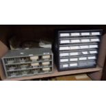 Two multi drawer chests and a box containing a large quantity of clock spares and other items