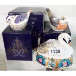 Three boxed Royal Crown Derby paperweights comprising Goldcrest and Bluebird with gold stoppers, and