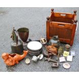 A square wooden planter containing assorted car badges and other collectables - sold with a wood hay