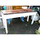 A 5' 3 1/2" pine plank top workbench with Woden 186B/5 vise, set on a painted base