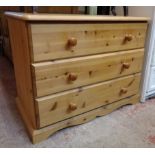 A 31 1/2" modern waxed pine chest of three long drawers, set on bracket base