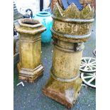 A 3' 3" Victorian terracotta chimney pot with vented crenellated top - sold with a 29" faceted