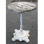 A painted cast iron table base with later circular top