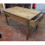 A 3' 11 1/2" continental rustic pine kitchen table with five plank top and single deep drawer to one