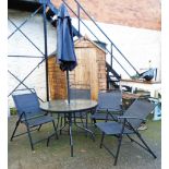 A modern patio set comprising four chairs, table and parasol - a/f