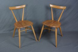 A PAIR OF ERCOL ELM AND BEECH STACKING CHAIRS, with single top rail on tapering supports,