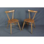 A PAIR OF ERCOL ELM AND BEECH STACKING CHAIRS, with single top rail on tapering supports,