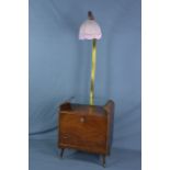 A 1950'S WALNUT ATOMIC COCKTAIL LAMP TABLE, with brass upright support overhead, bearing the label