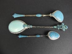 A NORWEGIAN WHITE METAL AND TURQUOISE ENAMEL TEASPOON, stamped Norway, together with a similar