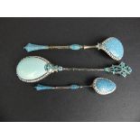 A NORWEGIAN WHITE METAL AND TURQUOISE ENAMEL TEASPOON, stamped Norway, together with a similar