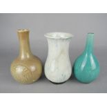 A 19TH CENTURY CHINESE CELADON ONION SHAPED VASE, incised back and front with a dragon within a