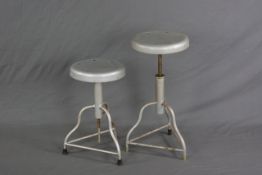 A PAIR OF INDUSTRIAL MACHINIST STYLE SWIVEL STOOLS, on triple wavy legs, approximate max height 69cm