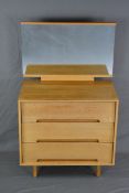 JOHN & SYLVIA REID LIGHT OAK DRESSING CHEST OF THREE LONG DRAWERS, a single mirror on raised rounded