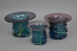 A GROUP OF BLUE AND PURPLE MDINA GLASS, with 'Helter Skelter' trails to the body, together with a