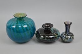 A LARGE BLUE STRIPED MDINA BOWL SHAPED VASE, with the glass blowers signature to the base,