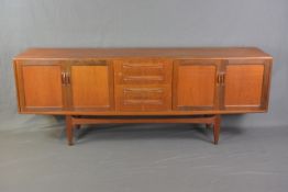 G-PLAN FRESCO 7FT TEAK SIDEBOARD, with four drawers central to two double cupboard doors,