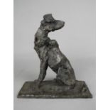 ROBERT CRUTCHLEY, a contemporary bronze figure of a seated dog with its head looking over its