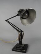 HERBERT TERRY & SONS LTD ANGLE POISE DESK LAMP, on a square two tier base (s.d.)