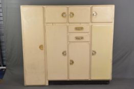 A 1960'S PAINTED KITCHEN CABINET, comprising of an arrangement of six cupboards and two small