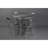 AN ALLERMUIR LUNA CIRCULAR CHROME DINING TABLE, approximate diameter 94cm and four matching