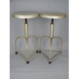 AN INDUSTRIAL MACHINIST STYLE SWIVEL STOOL, on triple legs and a similar stool on four legs (2)