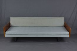 HILLE ROBIN DAY, a single convertible bed settee, with teak veneer arms on flat steel legs, the back