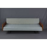 HILLE ROBIN DAY, a single convertible bed settee, with teak veneer arms on flat steel legs, the back