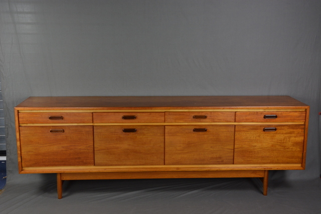 WHITE & NEWTON, PORTSMOUTH TEAK SIDEBOARD, with four drawers above four cupboard doors,