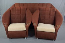 A MID 20TH CENTURY THREE PIECE LOUNGE SUITE, comprising of a three seater settee and a pair of