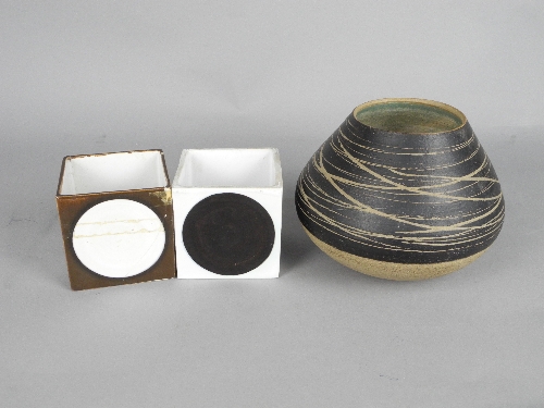 A TROIKA CUBE VASE, smooth white ground with a single black circle to the four sides, printed