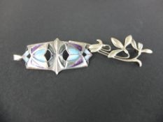 A PAT CHENEY SILVER AND ENAMEL PENDANT, of Art Nouveau style, bears remnants of brooch pin