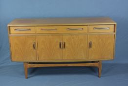 G-PLAN FRESCO 5FT TEAK SIDEBOARD, with two short and one long drawer above four cupboard doors,