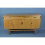 G-PLAN FRESCO 5FT TEAK SIDEBOARD, with two short and one long drawer above four cupboard doors,