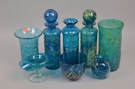 A GROUP OF BLUE MDINA GLASS, to include three ribbon trail decanters, a large textured vase, a