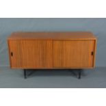 HILLE INTERPLAN TEAK SIDEBOARD BY ROBIN DAY, with double sliding doors, revealing various adjustable