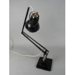 HERBERT TERRY & SONS LTD ANGLE POISE DESK LAMP, on a square two tier base (s.d.)