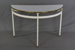 AN INDUSTRIAL STYLE MID 20TH CENTURY HALF MOON CONSOLE TABLE, with brass banded edge