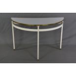 AN INDUSTRIAL STYLE MID 20TH CENTURY HALF MOON CONSOLE TABLE, with brass banded edge