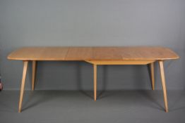 AN ERCOL ELM AND BEECH 1960'S FIVE LEGGED EXTENDING DINING TABLE, with double folding leaf,