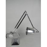 A CHROME SIMPLUS STYLE DESK LAMP, on a counter balanced frame on a square base