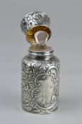 A LATE VICTORIAN SILVER SCENT BOTTLE, Chester 1899, with stopper, repousse floral and foliate scroll