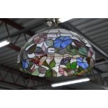 A TIFFANY STYLE LEAD GLAZED CEILING LIGHT, with various coloured glazing (shade damaged)