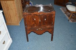 A GEORGIAN MAHOGANY TWO DOOR CABINET, with gallery top and single drawer, approximate size width