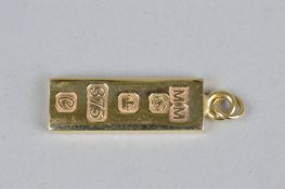 A 9CT GOLD INGOT PENDANT, approximate length 31mm, approximate weight 15.5 grams