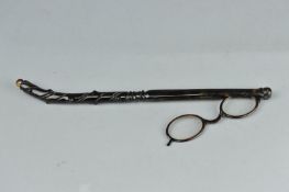 A PAIR OF VICTORIAN TORTOISESHELL LORGNETTES, with long carved stem