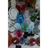 SEVENTEEN PIECES OF COLOURED GLASSWARE, including vases, jars and covers, cranberry pieces, s.d. (