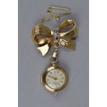 A 9CT YELLOW GOLD CASED LADIES Bentina Star pendant watch attached to sapphire and diamond 9ct