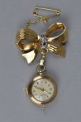 A 9CT YELLOW GOLD CASED LADIES Bentina Star pendant watch attached to sapphire and diamond 9ct