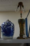 CHINESE BLUE AND WHITE GINGER JAR, with wooden cover and a gilt table lamp (2)